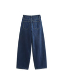 Jeans a gamba larga con taglio obliquo